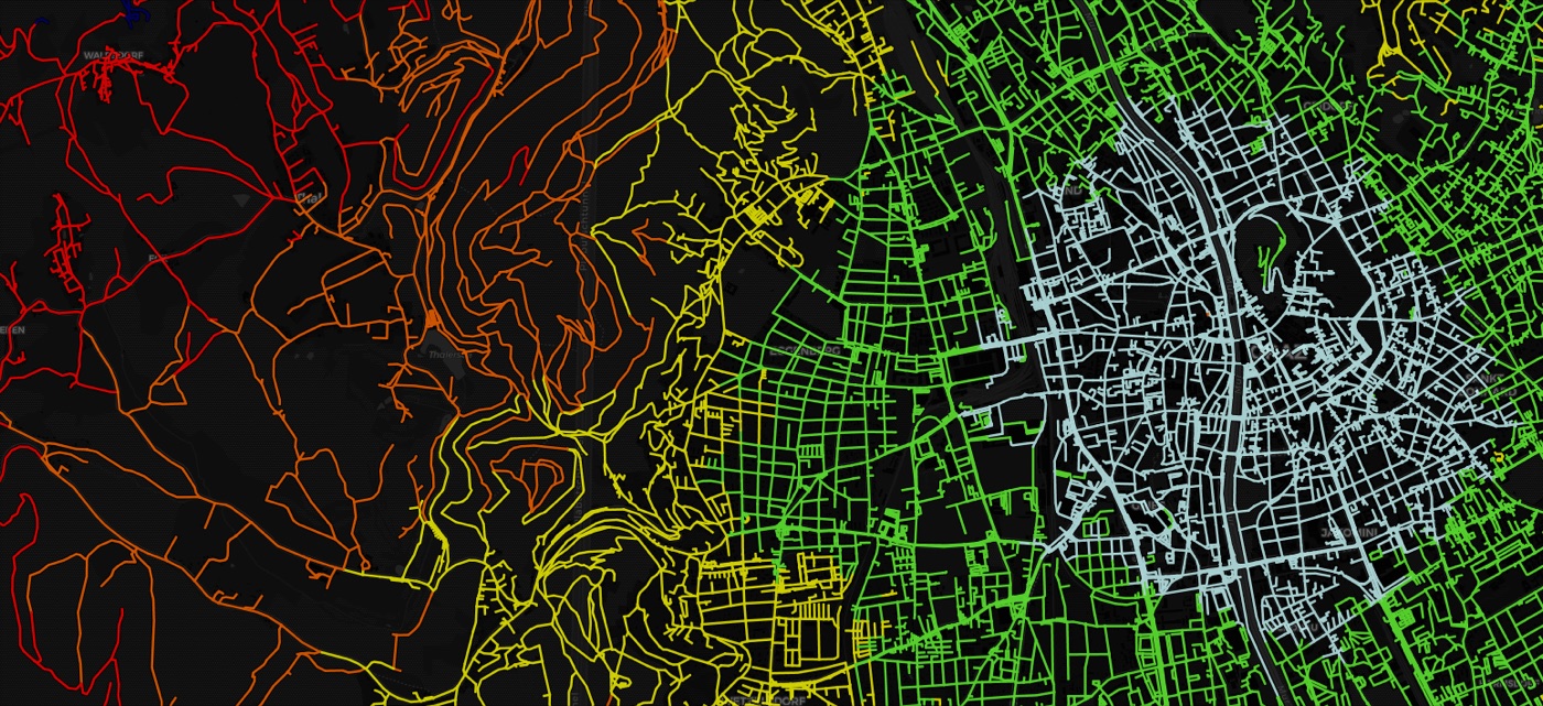 Action radius: road network coloured from light blue via green and yellow to red by riding time